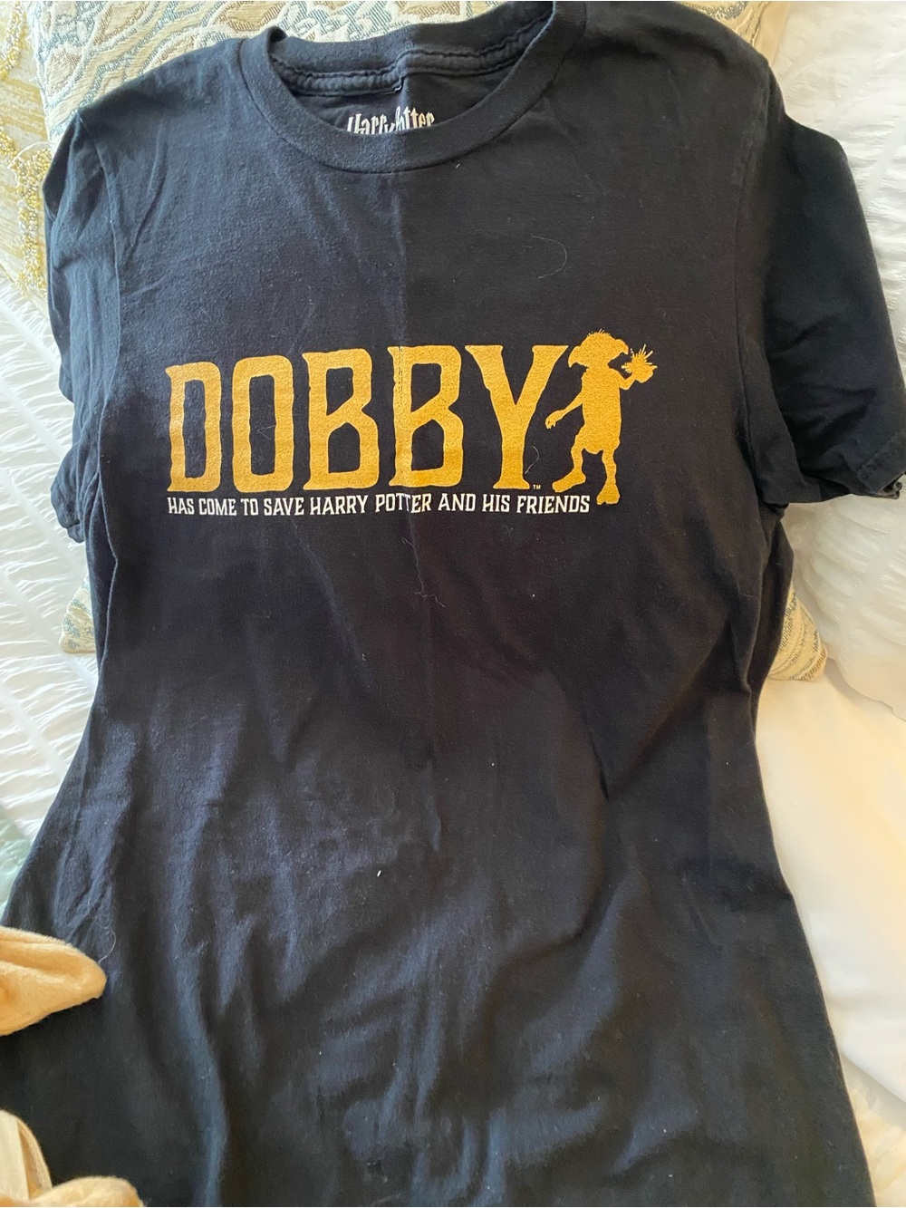 Warner Bros. Black Tee with Gold Dobby Graphic